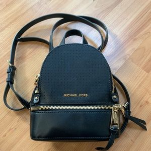 Michael Kors Rhea Mini Perforated Leather Backpack in Black